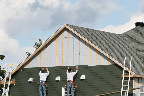 Professional Siding technician working in Rogers, OH